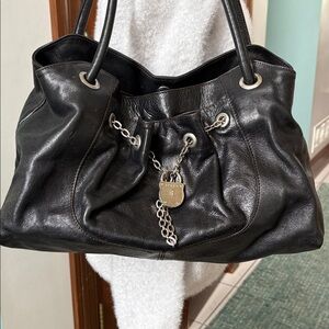 Furla Vintage large shoulder bag
Smooth black leather  front pocket/lock & chain